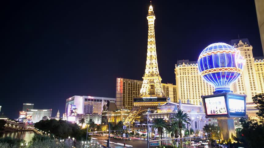 Cars drive on the Las Vegas strip at night