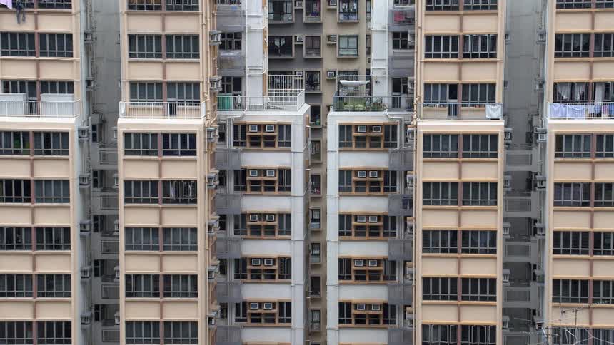 Tall buildings stand in a city