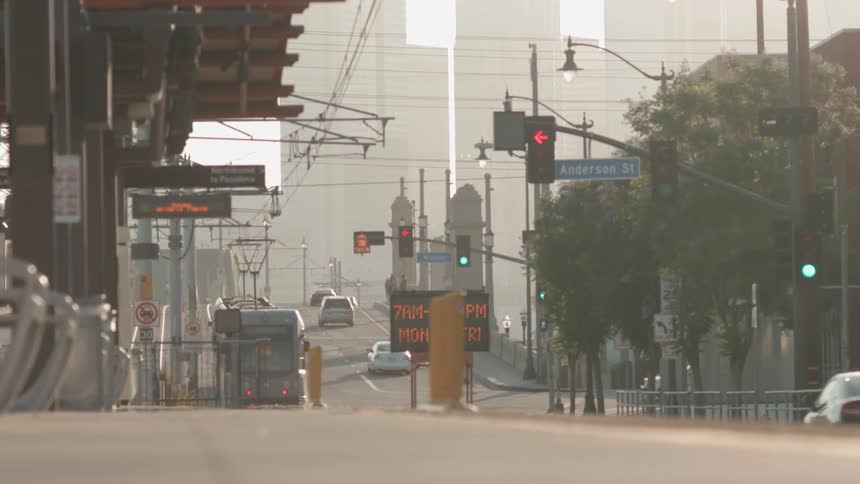 Trolley car travels down the tracks