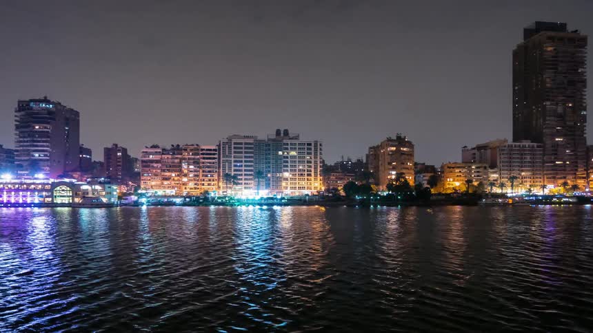 Looking at the city lights along the waterfront
