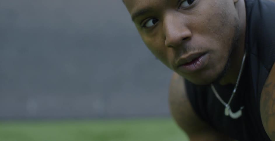 A football player trains indoors