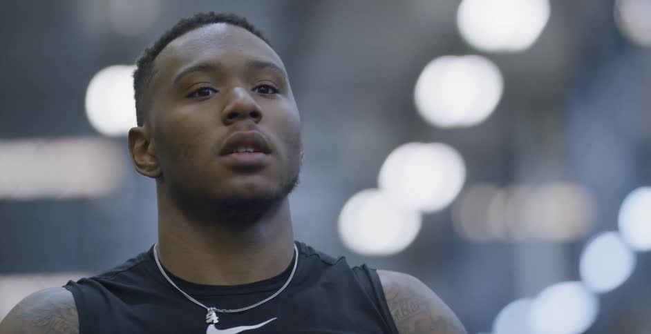An athlete prepares to train indoors