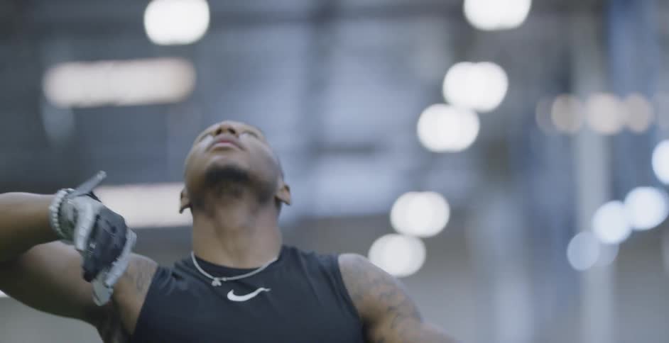 A football player trains indoors