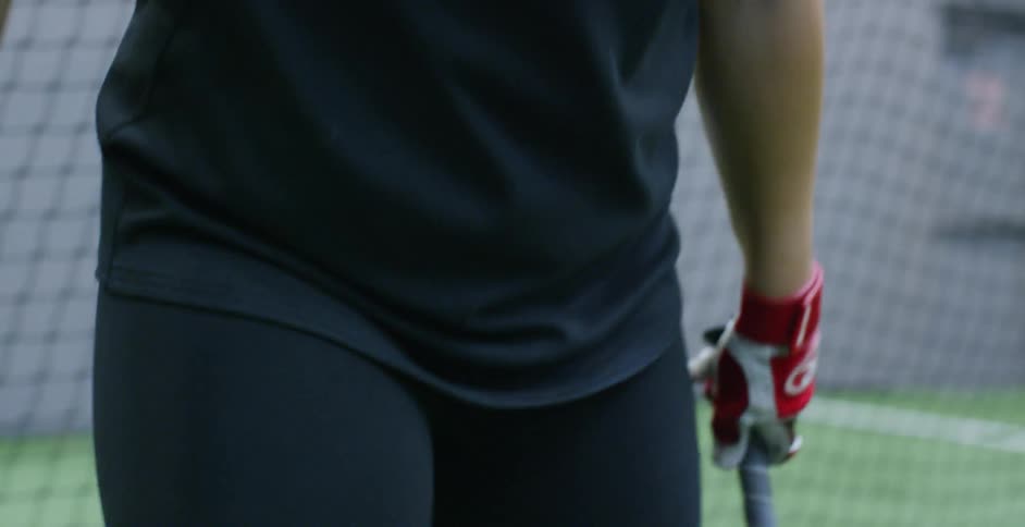 A baseball player readies for the pitch