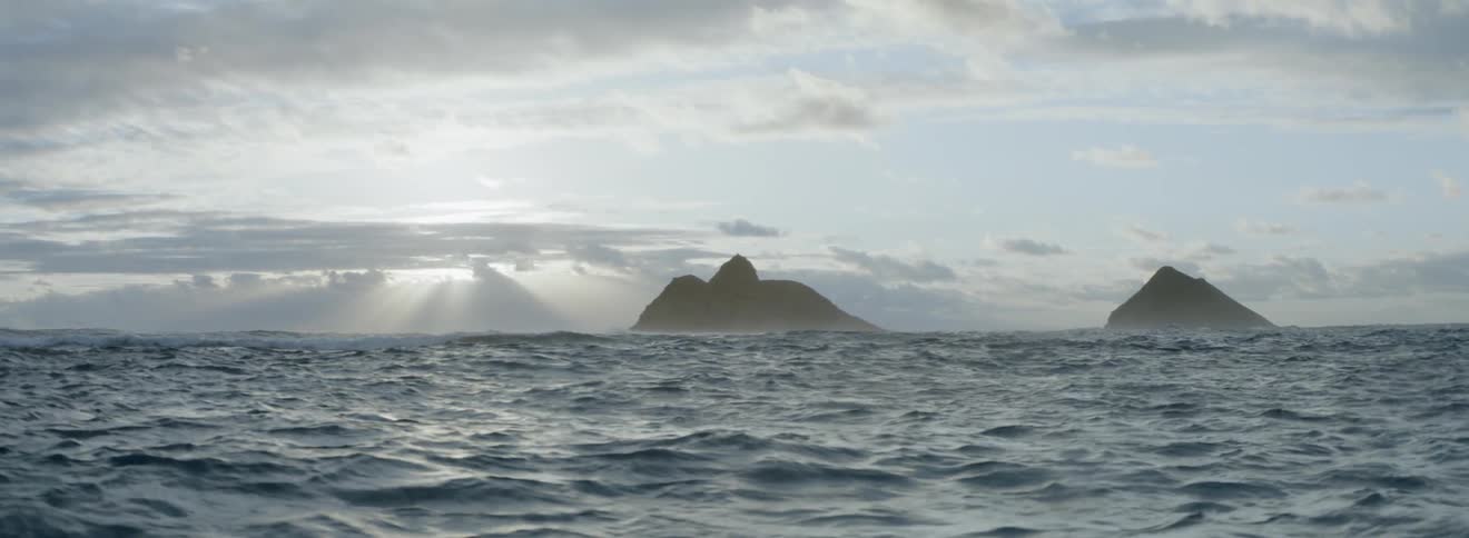 The tide flows on the rocky ocean waters