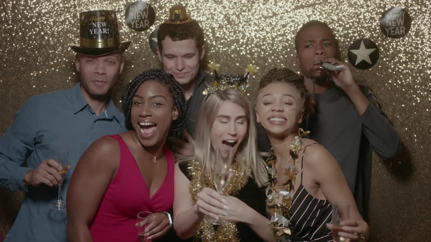 Friends celebrate the new year with champagne