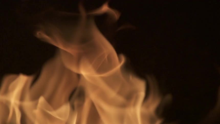 Fire flaming in a dark area