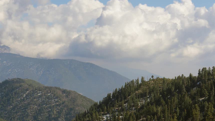 Clouds roll  into the view in the distance