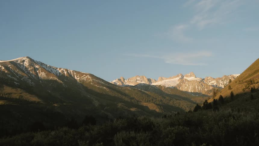 Clouds passing over a mountain