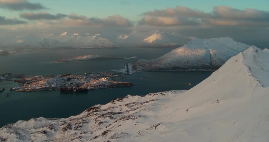 Storm clouds are hanging over a remote coast in winter