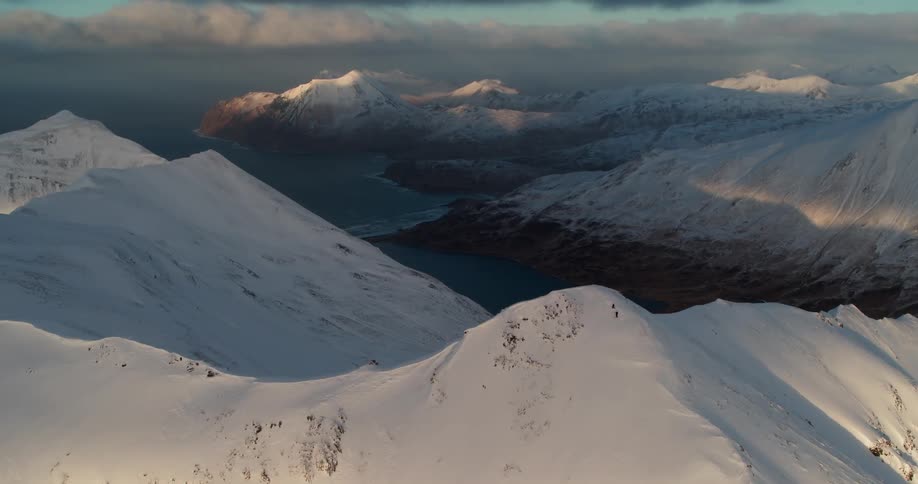 Snowy mountains above the sea