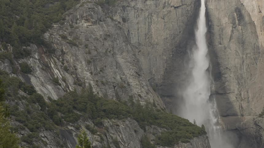 A waterfall rolling down a cliff side