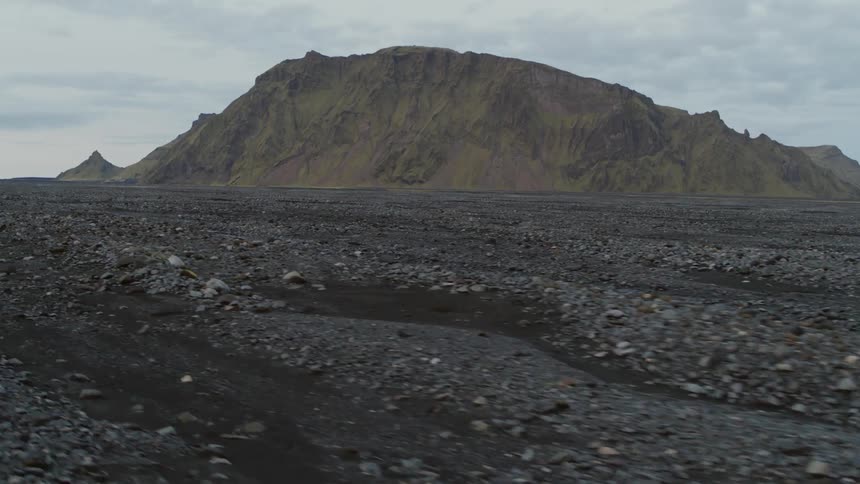 Dirt and rocks cover a rural field