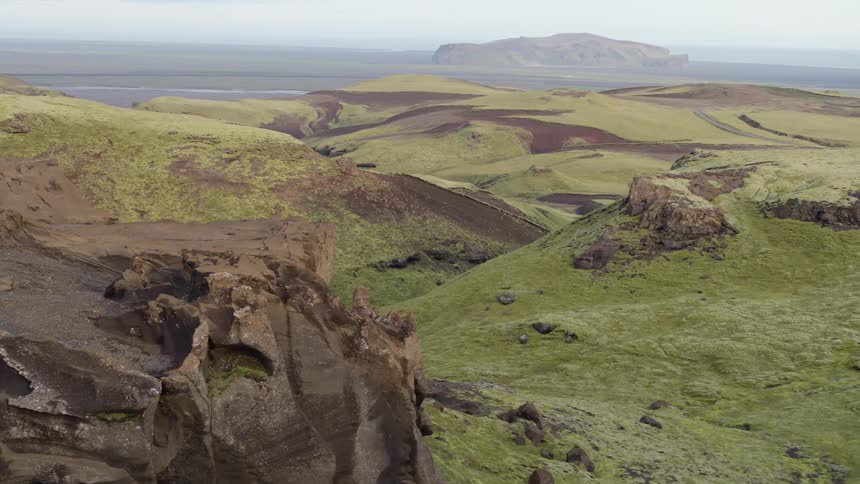 Hilly landscape and a large body of water