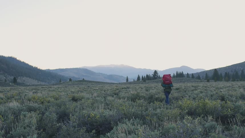 A person wearing a backpack
