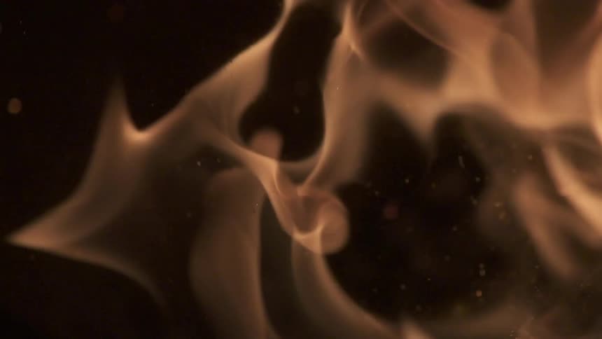 Flames from a fire at night