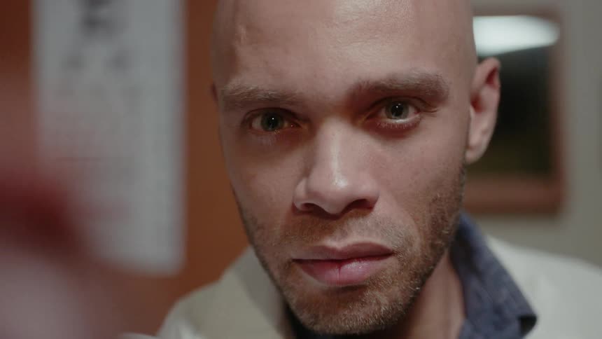 Man looking intensely at something in front of him