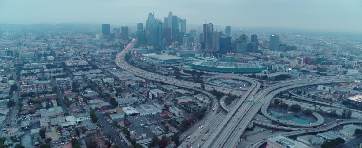 Cars travel on a city highway system