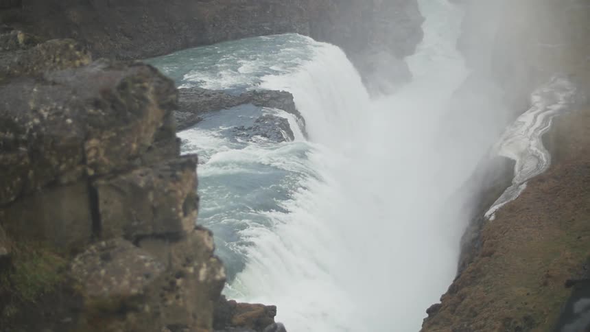 A waterfall rolling down a cliff side
