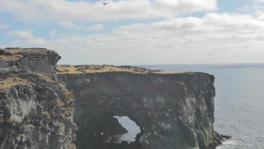 A rocky jagged cliff side