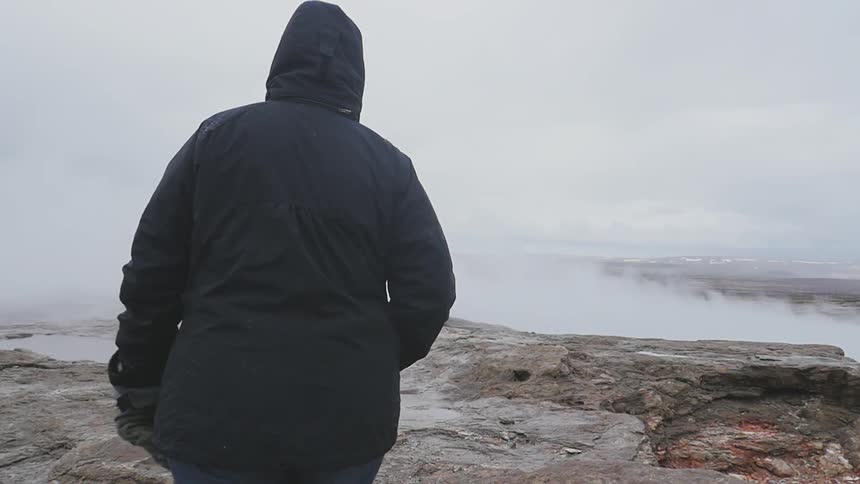 A person wearing a coat
