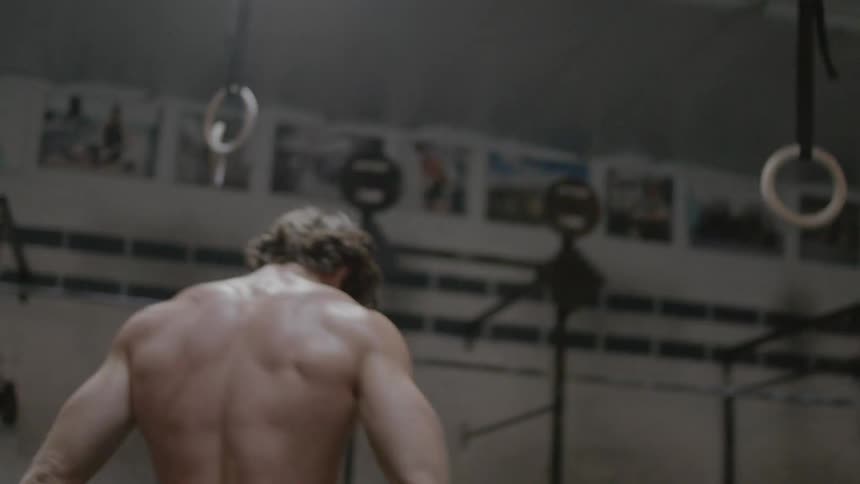 A man exercises in a gym