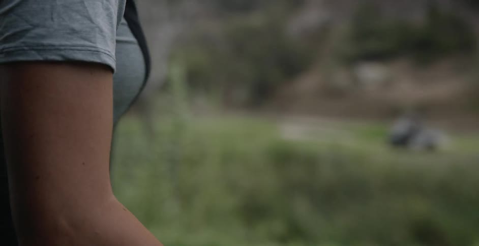 A woman takes out her golf club
