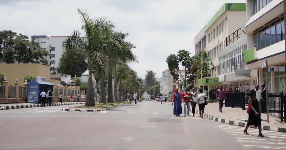 Pedestrians walk in a city