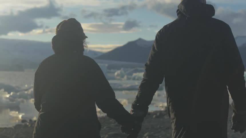 People walking and holding hands