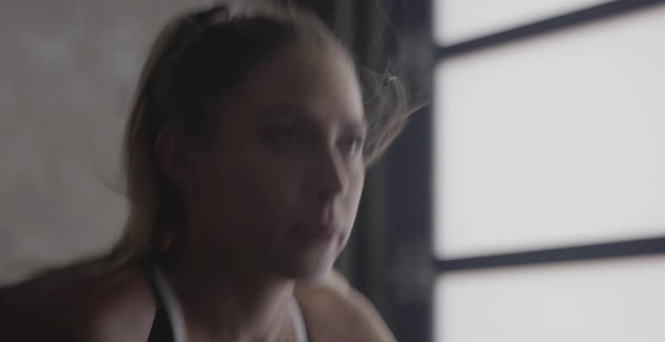 Woman exercises and runs in place