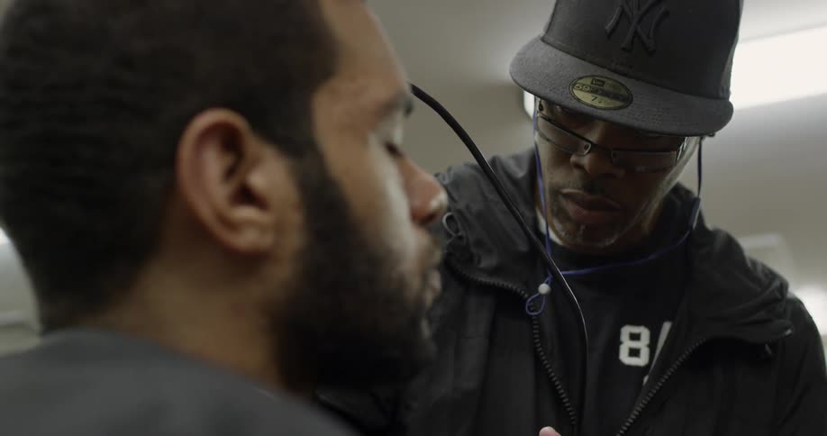 Emt examines man