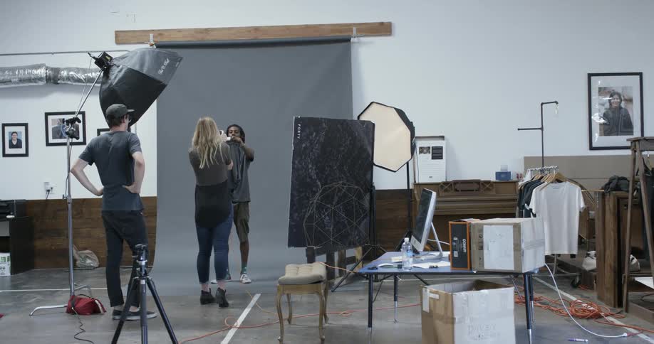 People are setting up for a photo shoot