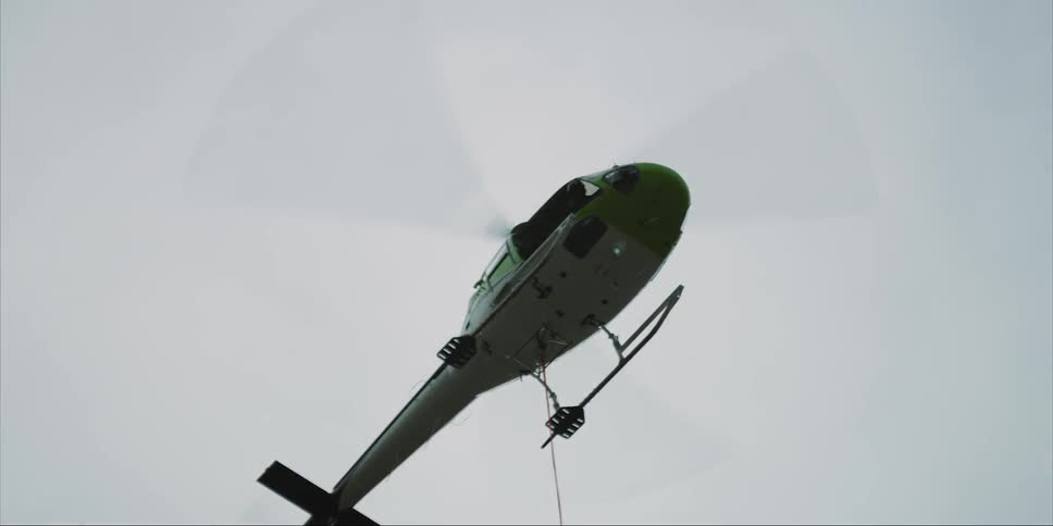 A helicopter flies in the sky