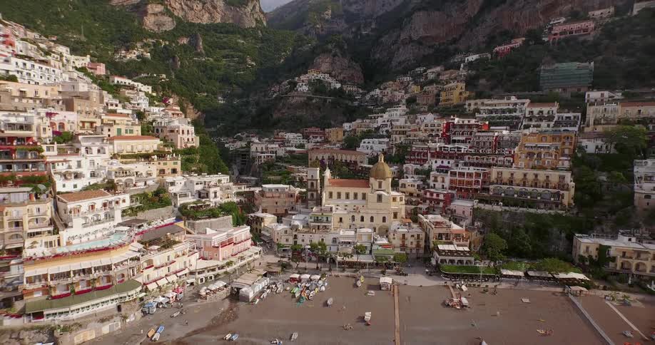 A large city is built on the side of a mountain
