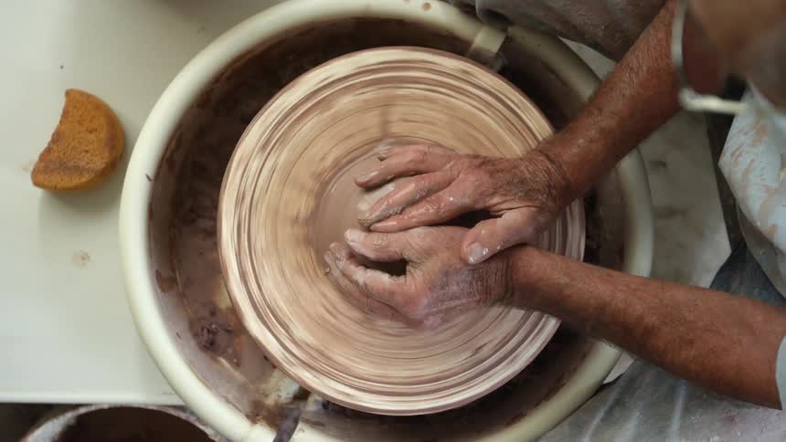 A person making pottery