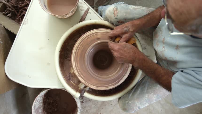 A person making pottery