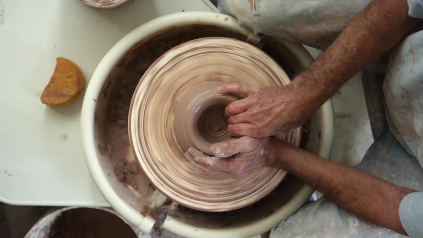 A woman is making a bowl