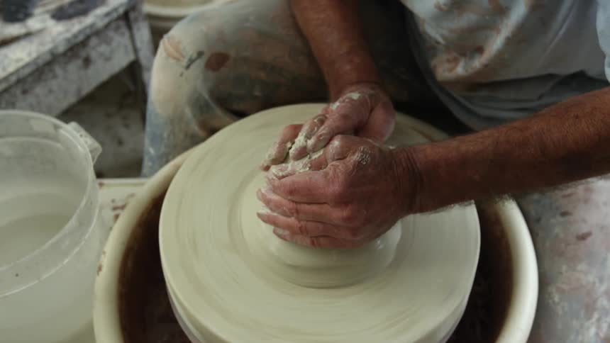 A person making pottery