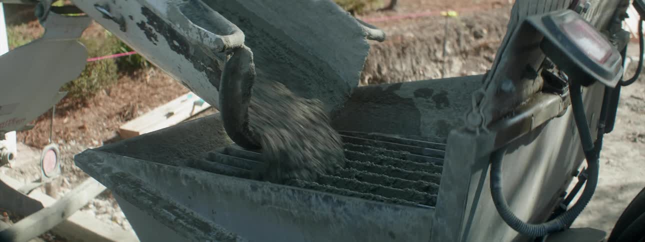 Concrete is poured down a chute