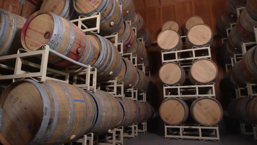 A stack of barrels in a warehouse