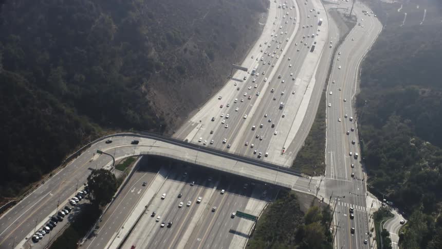Cars drive on a highway