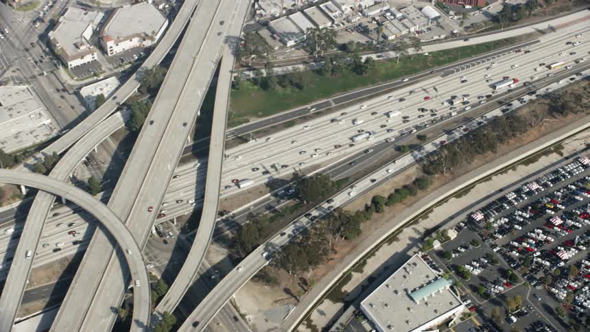 A web of highways and vehicles traveling over them