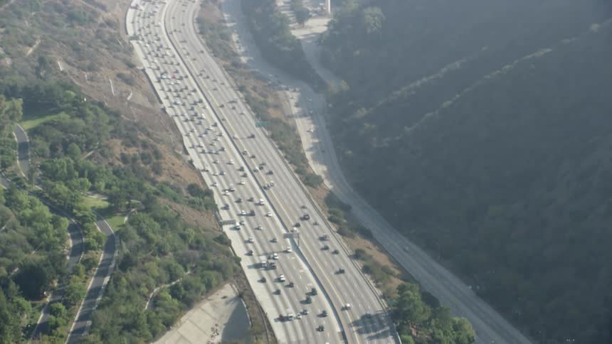 Cars drive on a highway