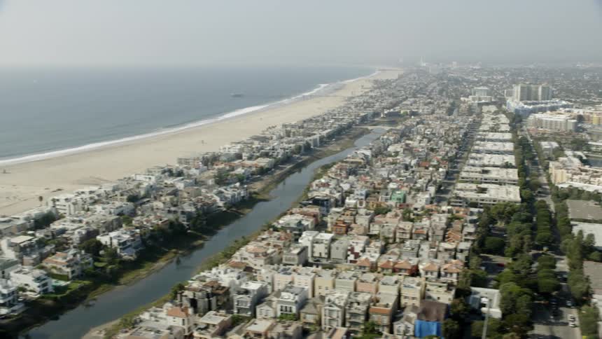 Homes and buildings on the beach in a coastal city