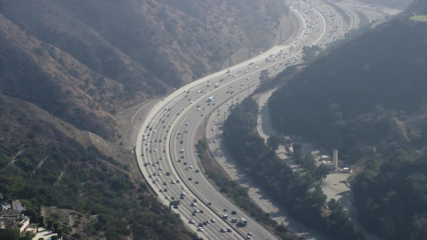Cars drive on a highway