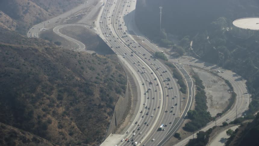 Cars drive on a highway