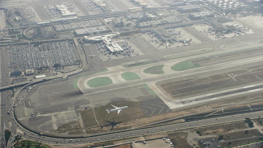 Large plane landing on a runway