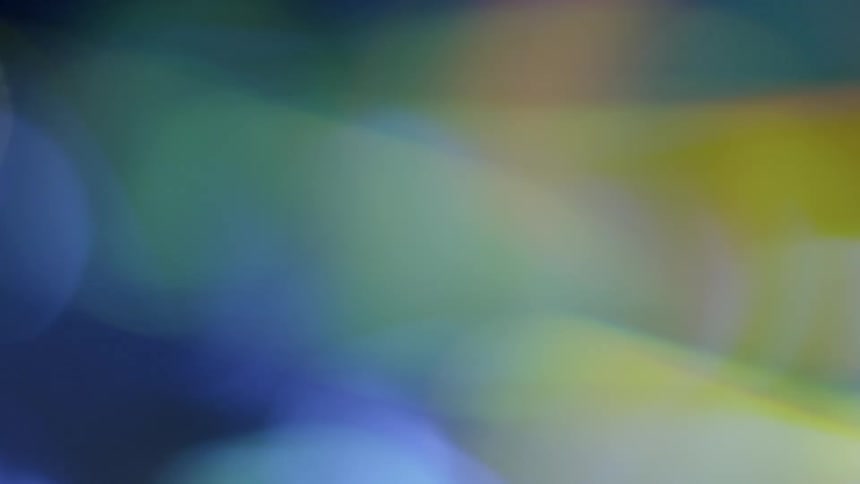 Light and shadow are moving across a reflective surface