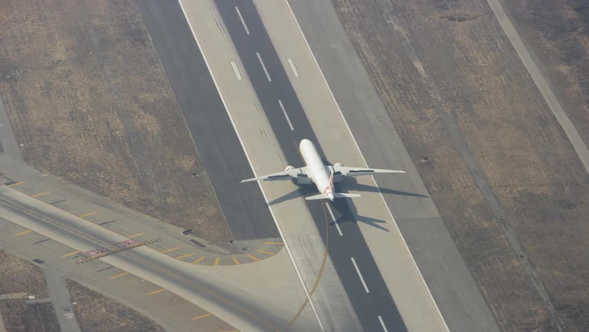 An airplane taxis on the runway