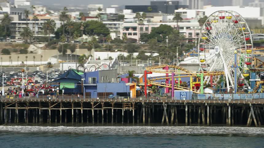 An amusement parks is set up along a wharf
